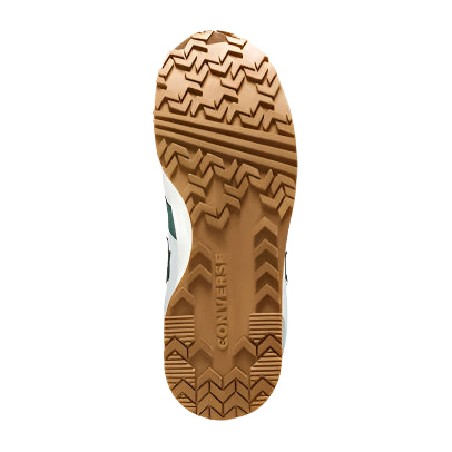 Close-up of a brown sole with a textured pattern on a white background