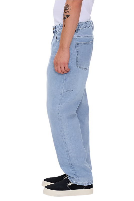 Light blue jeans worn by a person on a white background
