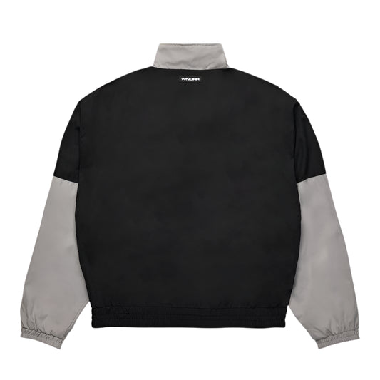 Black and gray jacket with brand logo on the back against a white background