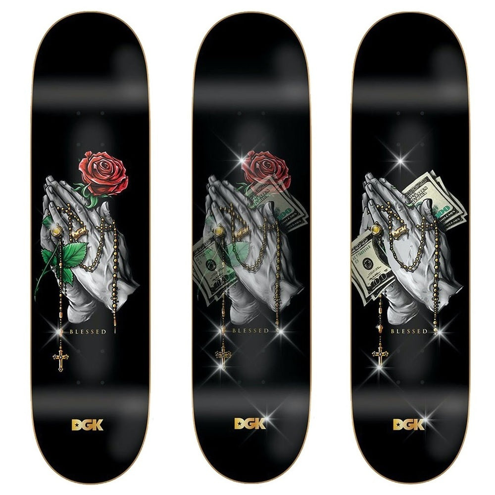 Three DGK skateboard decks with artistic designs of hands, roses, and money on a black background.