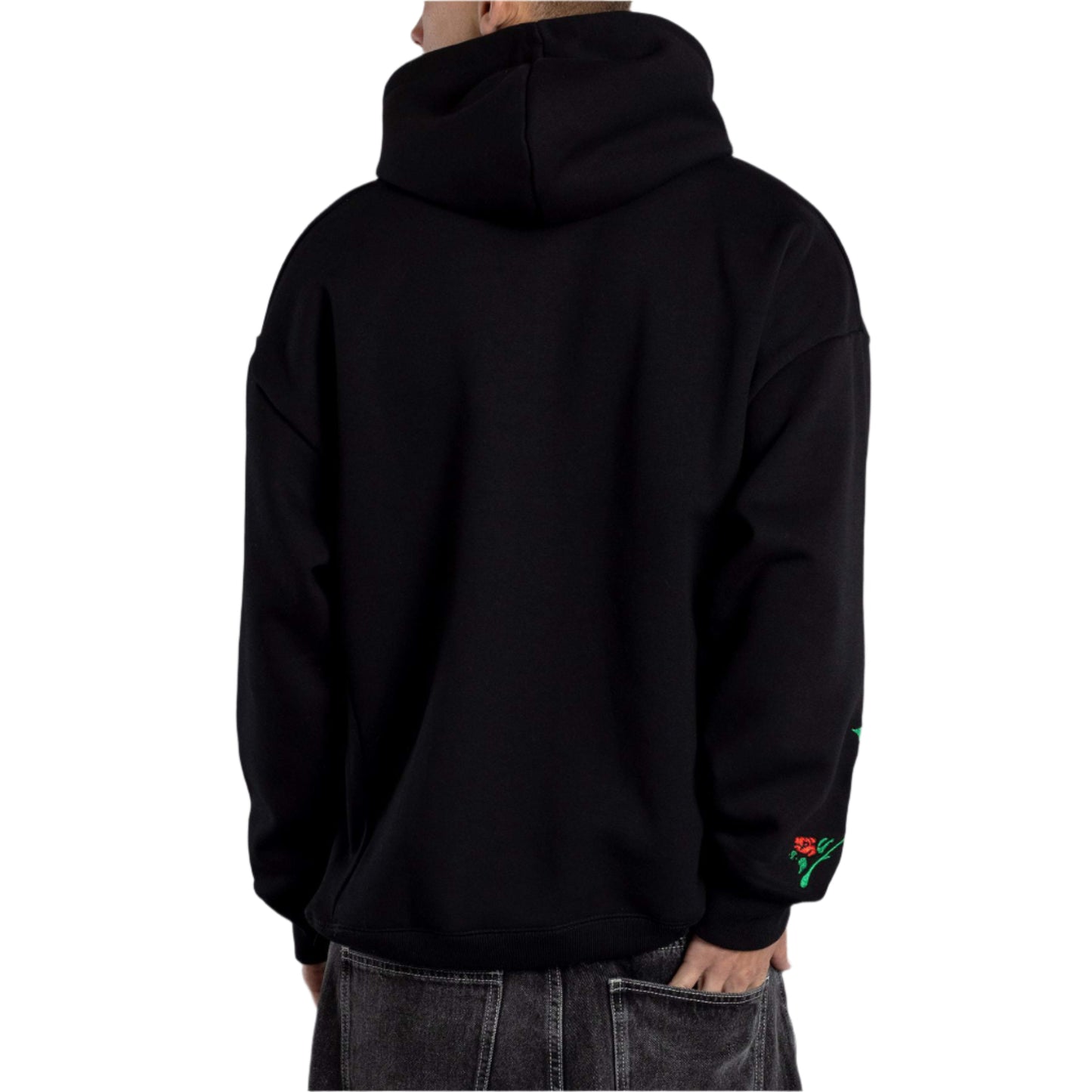 Person wearing a black hoodie with a gray background