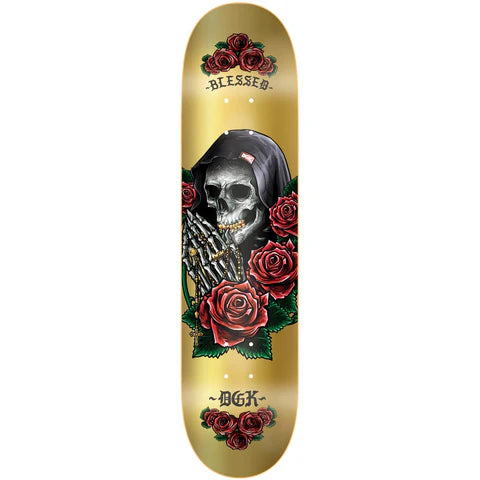 Skateboard deck with a skull and roses design on a gold background