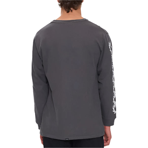 Person wearing a gray long-sleeve shirt with white text on the back against a light gray background