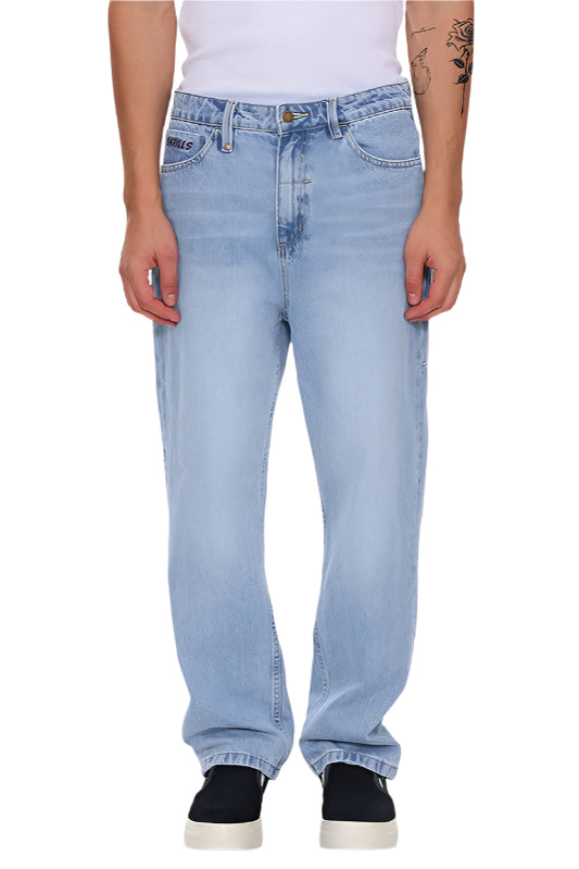 Light blue jeans worn by a person on a white background
